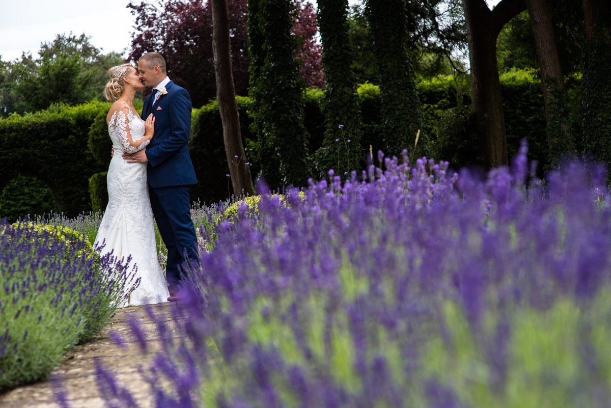 Romantic wedding photography taken in the grounds of Kent venue Allington Castle