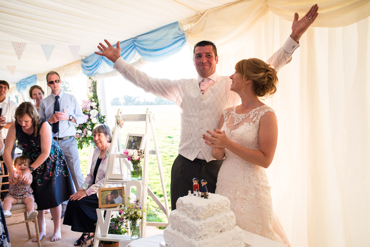 Photograph of Kif and Becky after cutting their wedding cake