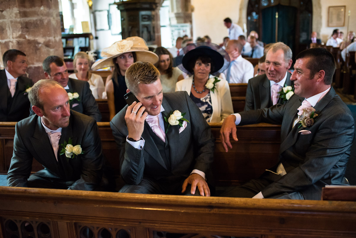 Photograph of Kif and his groomsmen before his Kent wedding ceremony in Marden Church