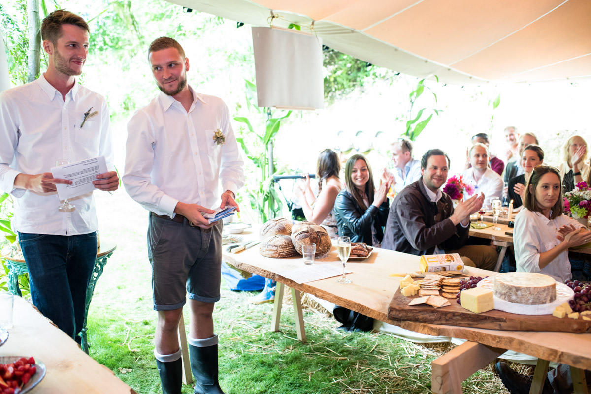 Best men are photographed making their speeches at Seb and Brogans Kent wedding