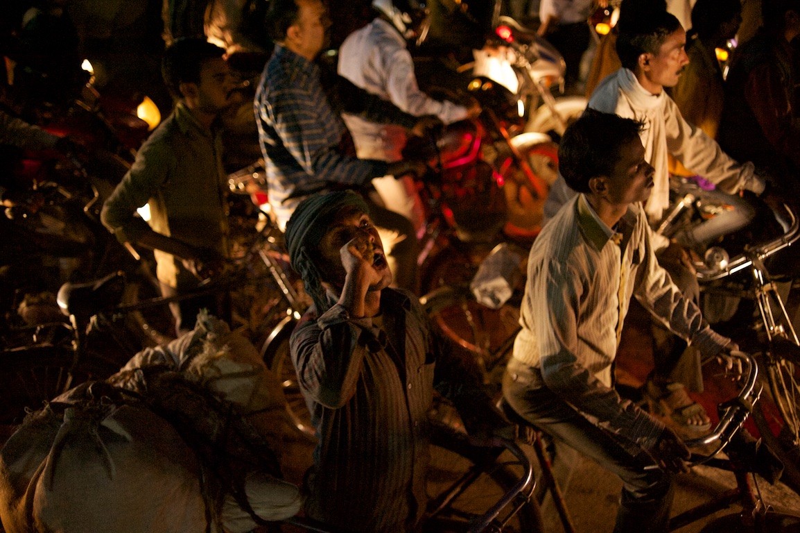 traffic jam of motorbikes and rickshaws in varinasi