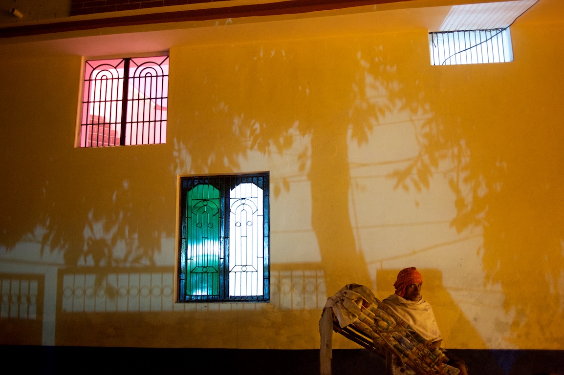 photograph of shadows from trees and rickshaw in varanasi