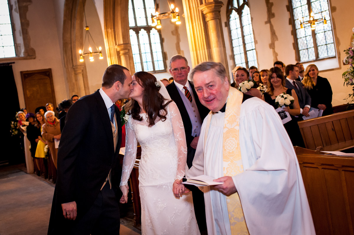 First kiss wedding photograph