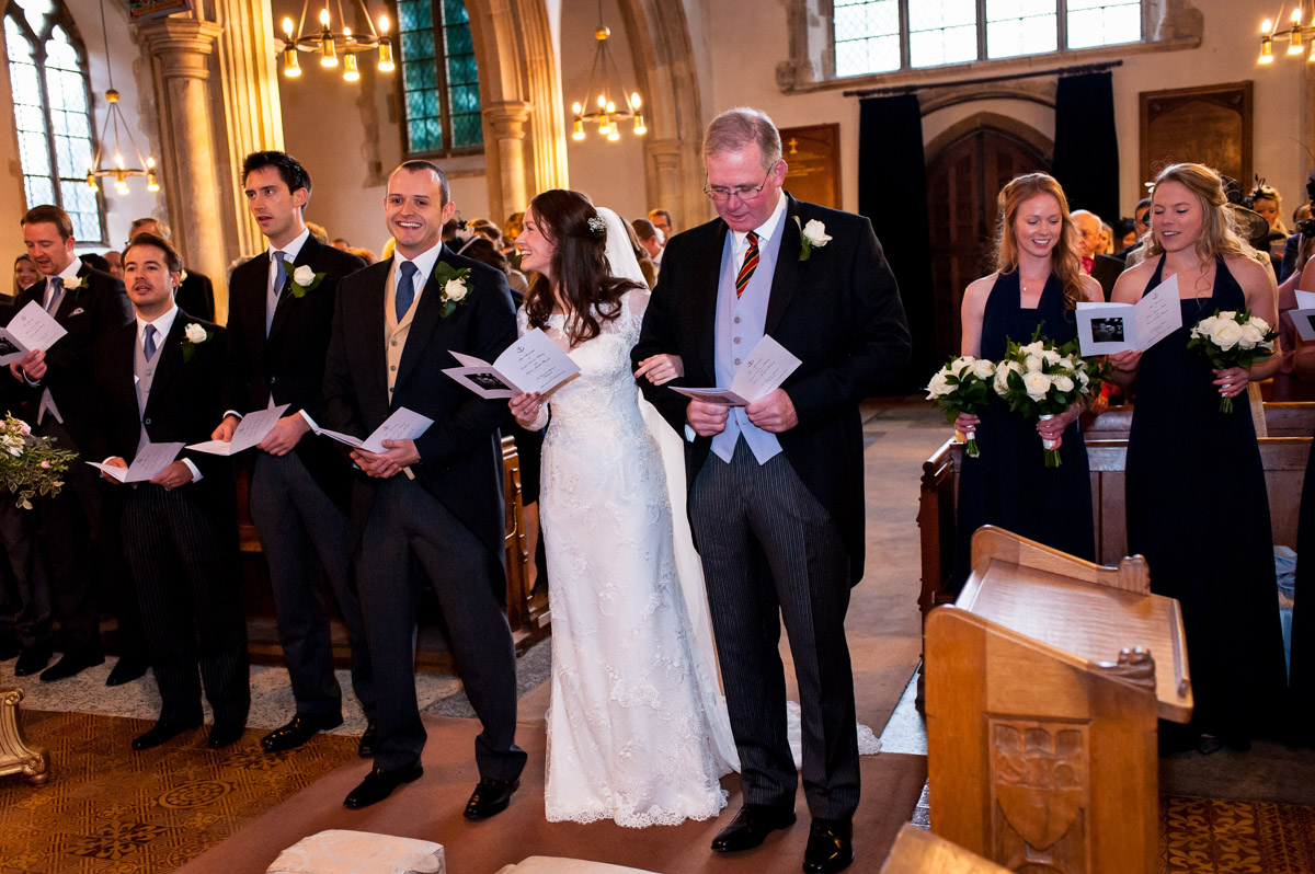 Wedding photography inside the church during Emma at Ollie's ceremony