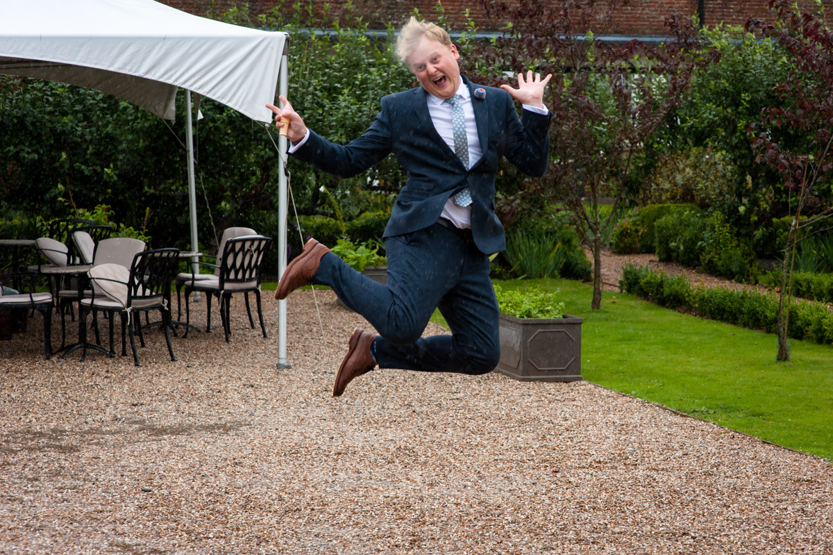 wedding guest having fun at secret garden wedding