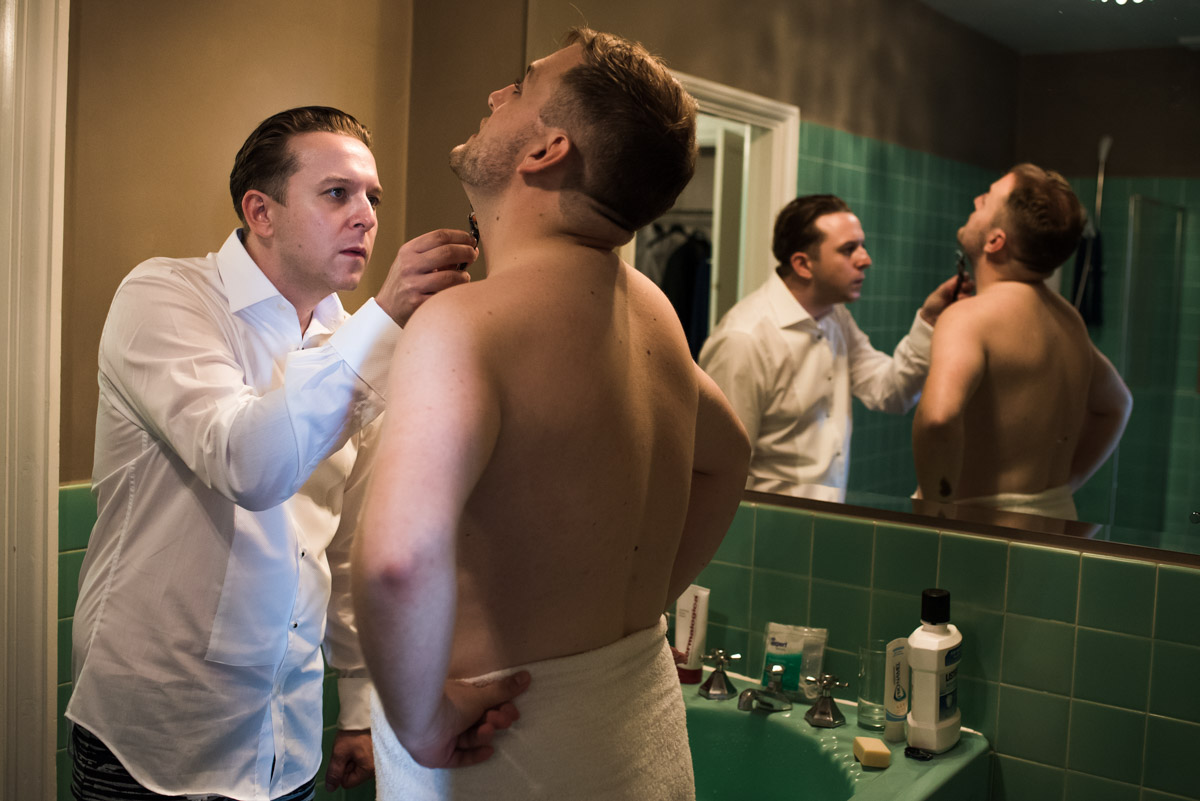 Wedding photography in kent at David and Simons Port Lympne Mansion wedding. david and Simon getting ready.