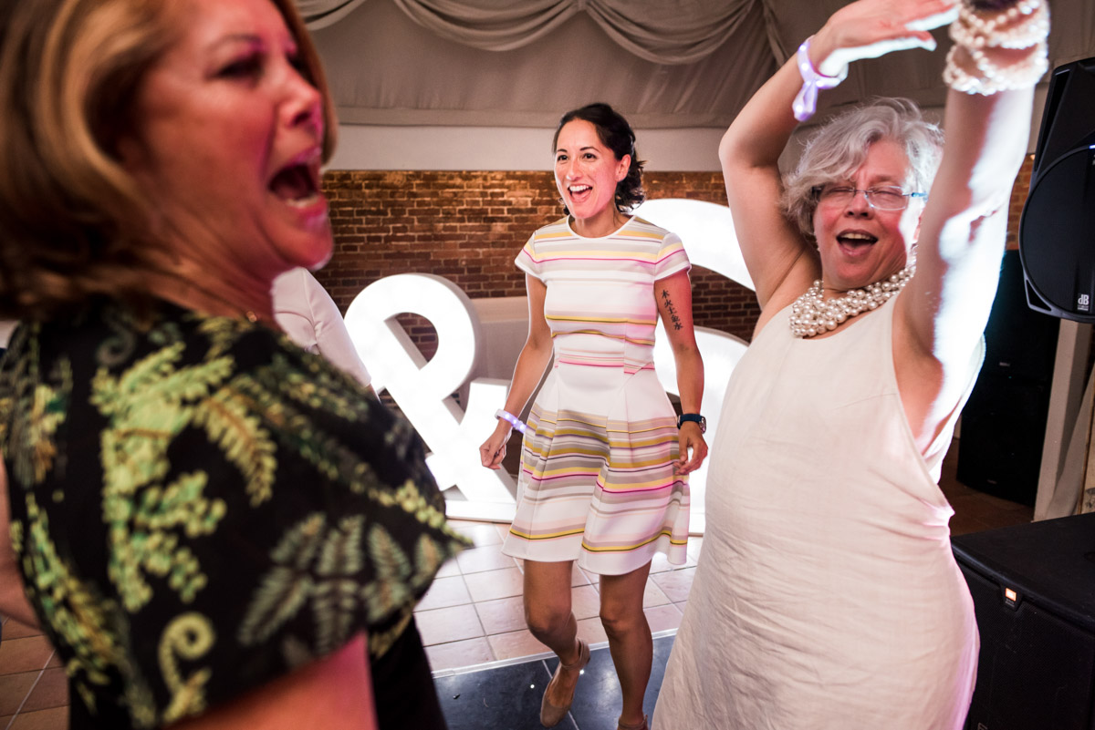 David and Simons wedding guests enjoy the dancing at their wedding reception in Kent