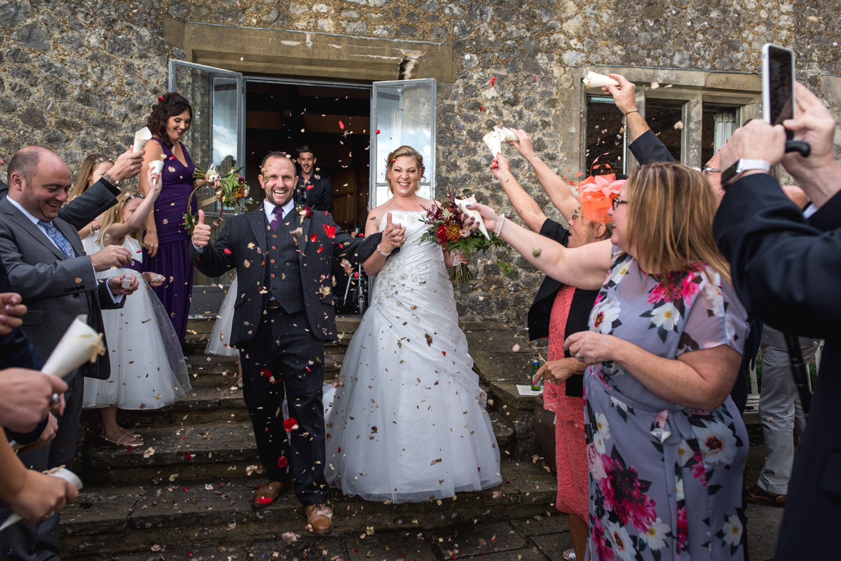 Wedding confetti photograph at John and Liannes Lympne Castle wedding in Kent