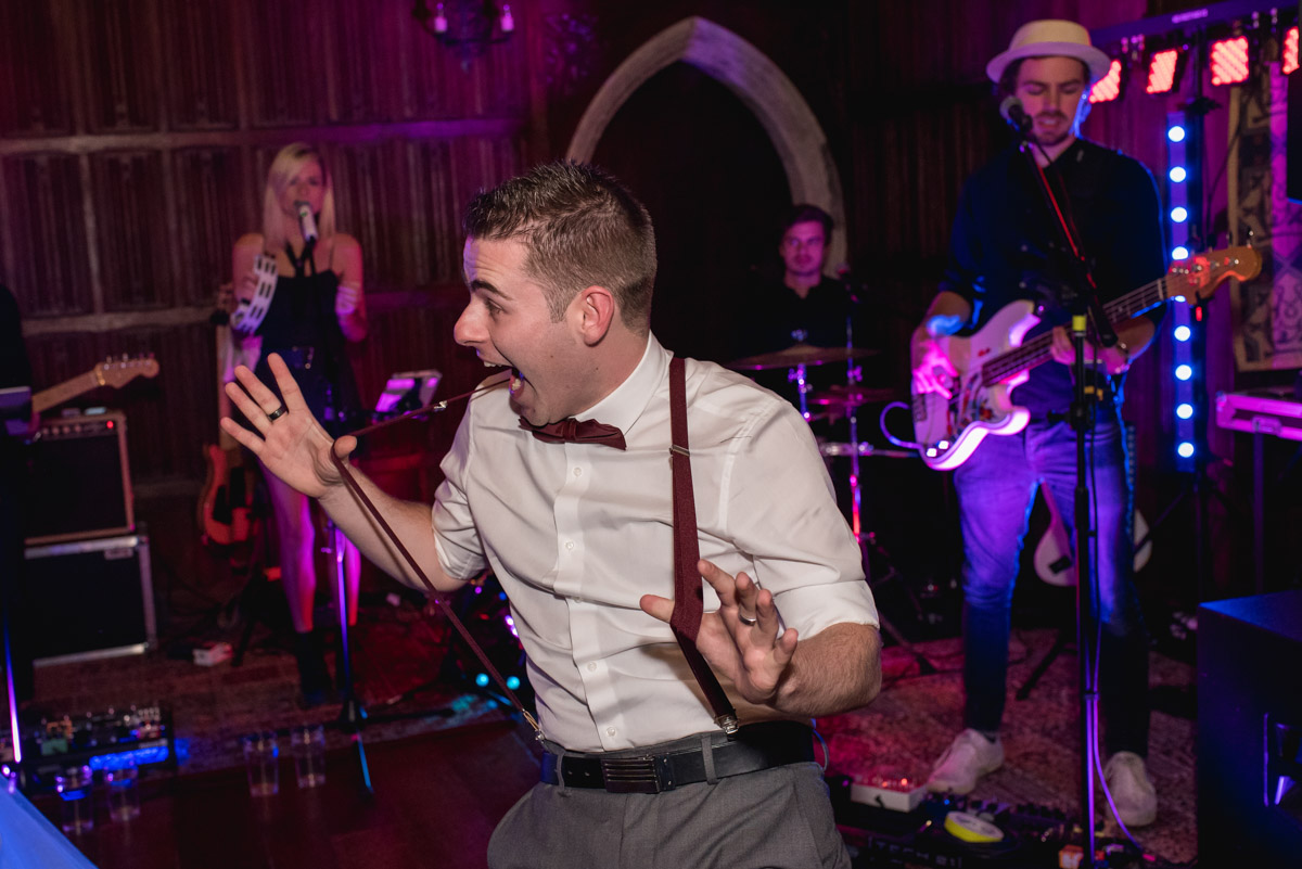 Lianas brother on the dance floor at his sisters wedding at Lympne Castle in Kent