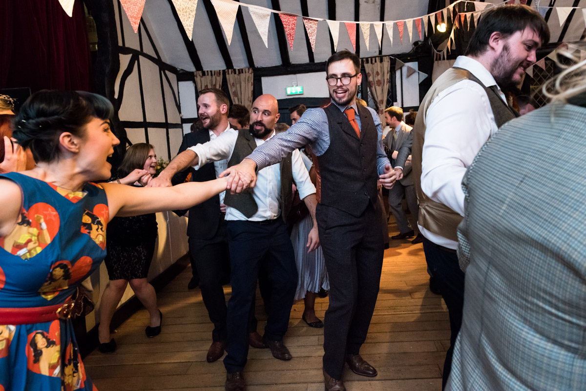 Ceilidh dance during Paul and Lauras wedding reception in kent