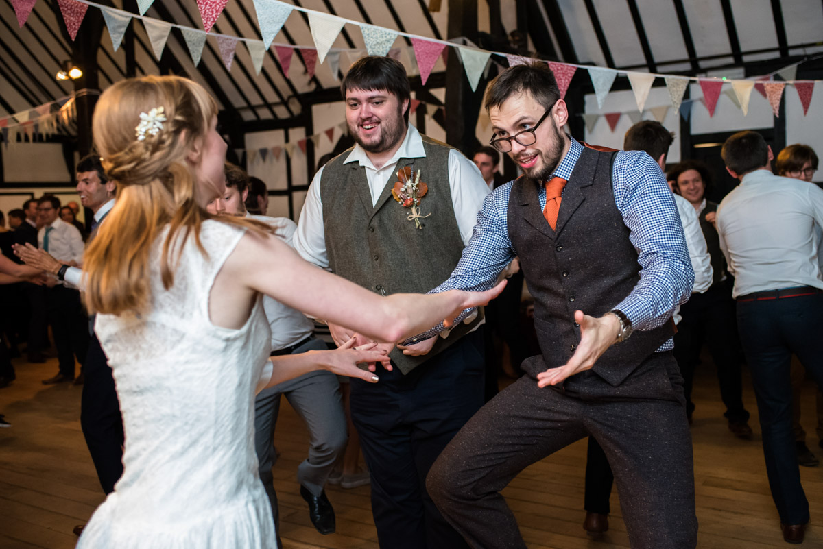 Paula dn Laura photographed during their wedding reception ceilidh