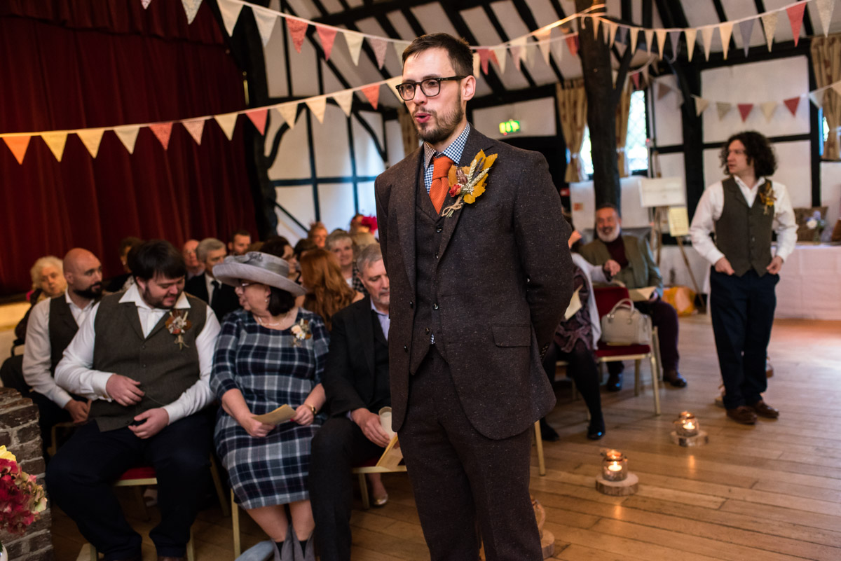 Kent wedding photography at Chilham Village Hall, Paul waits for the arrival of Laura before the ceremony