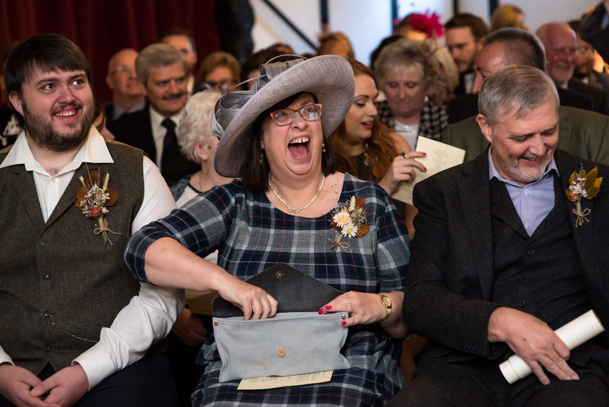 Pauls mum is photographed laughing before the wedding ceremony in Kent