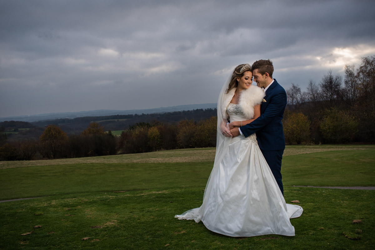Photograph of Jade and Stuart on Dale Hill Golf course at their wedding reception