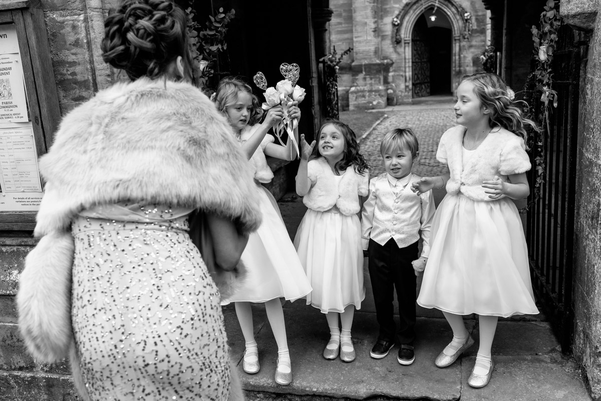 Black and white photograph of the flower girls and page boy at Jade and Stuarts Kilndown Church wedding in Kent