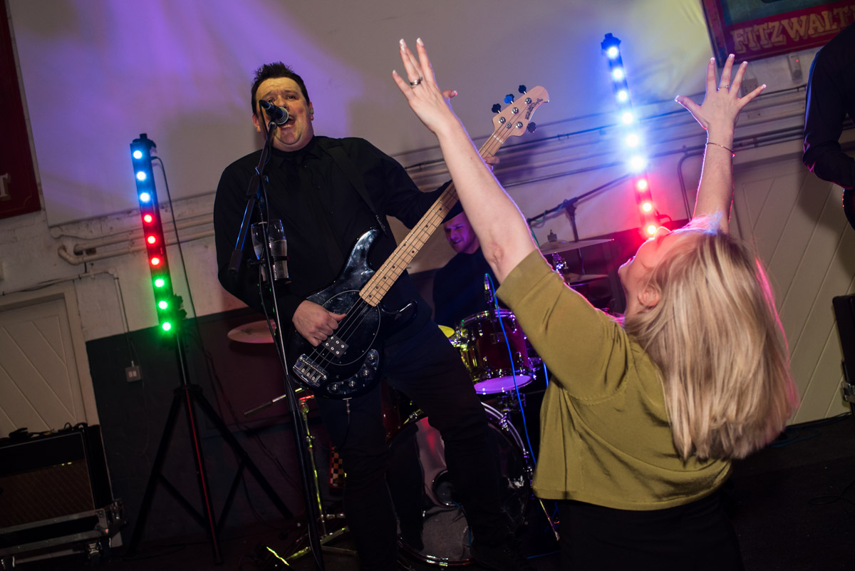 Photograph of wedding guest dancing at Kent brewery