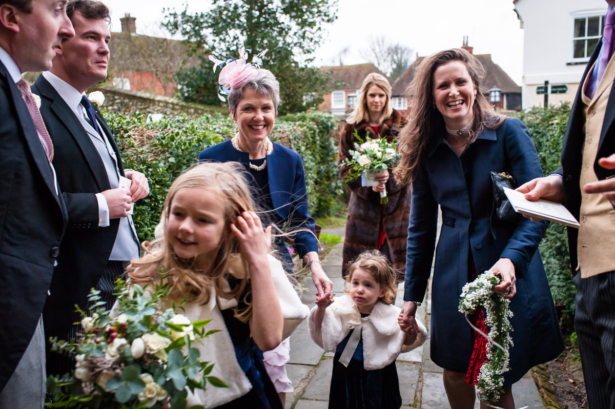 Photograph of wedding guests arriving at Elham church in Kent