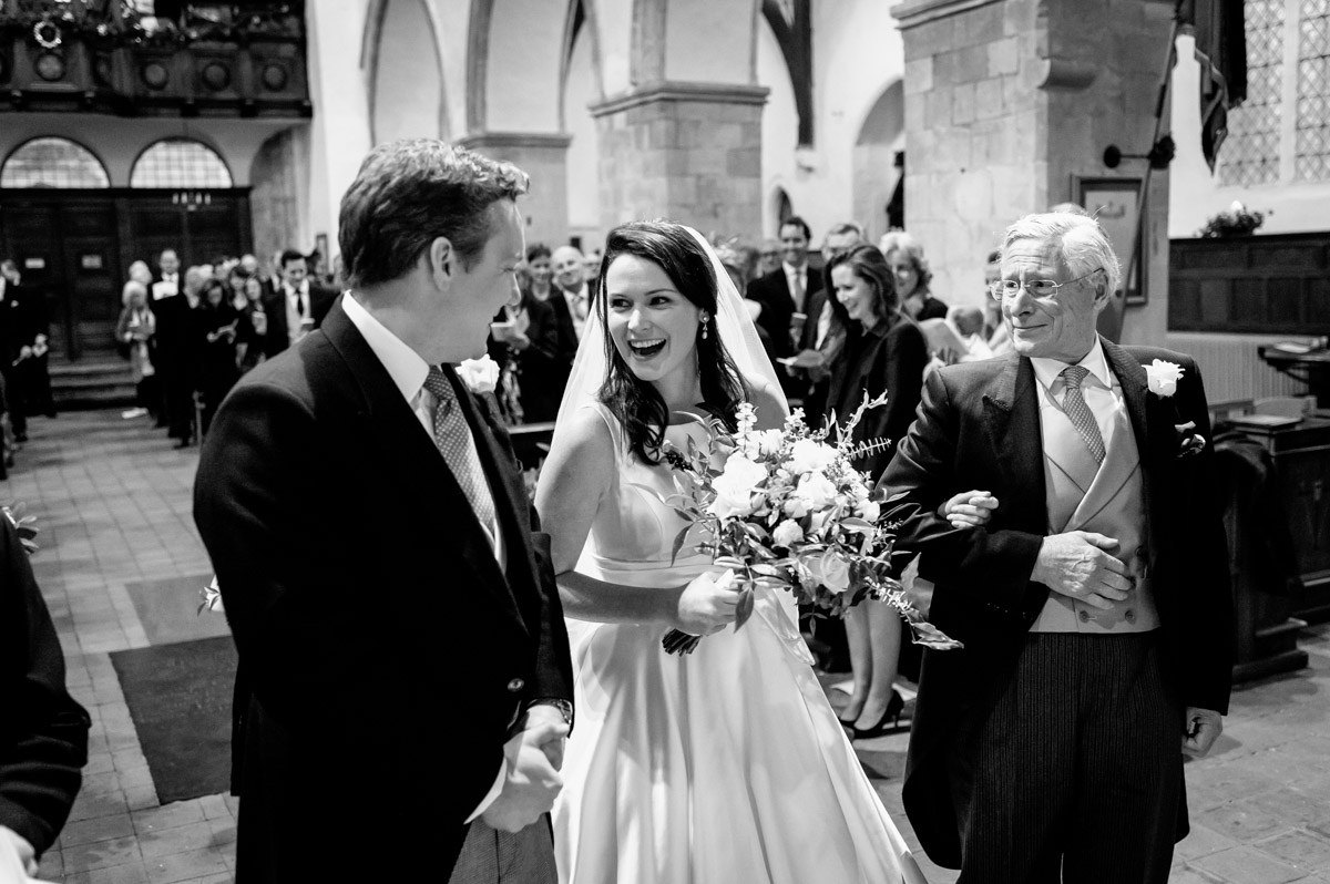 Frances is photographed reacting to seeing Marcus during their Kent wedding ceremony