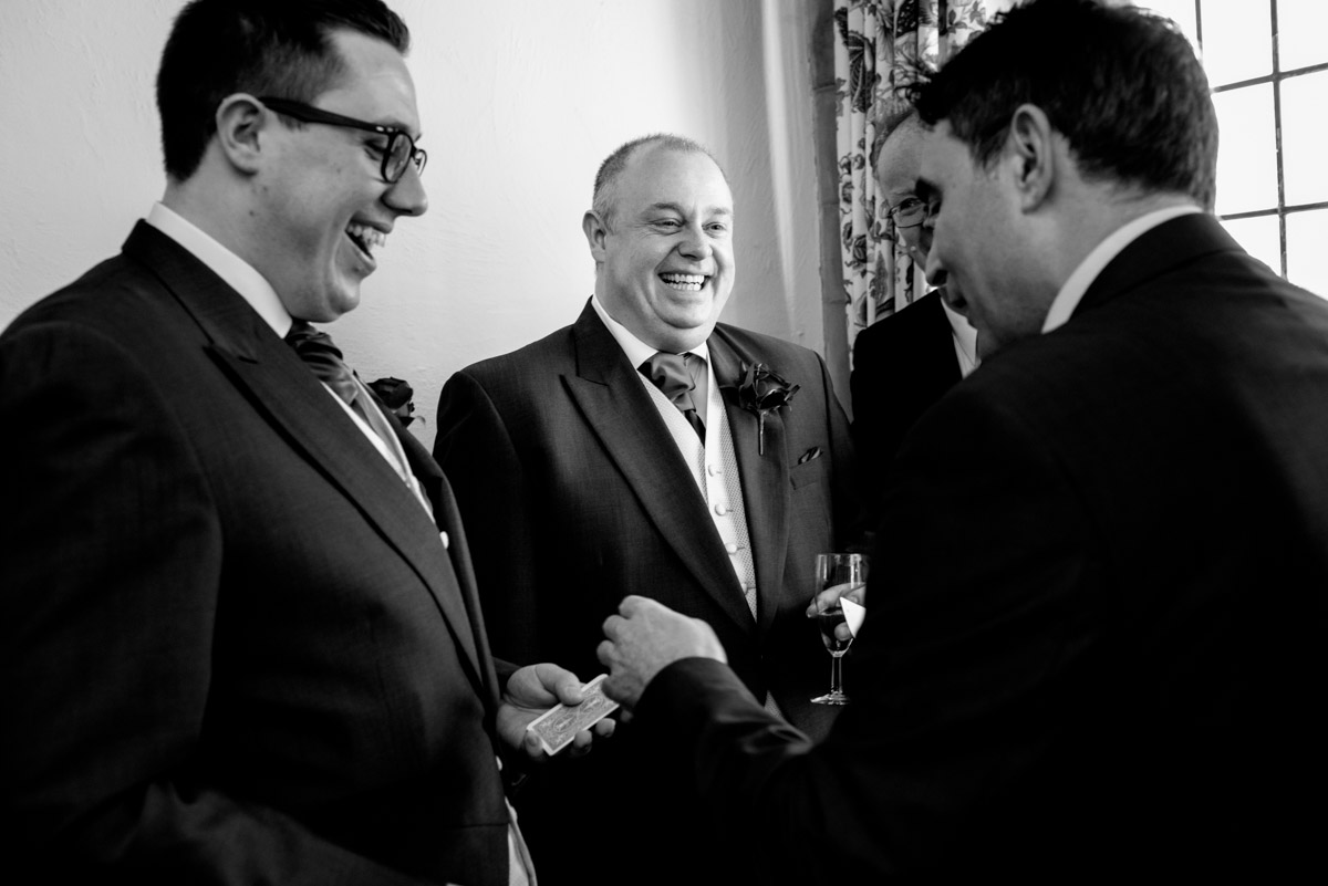 Nick and his wedding guests enjoy Etiennes magic tricks