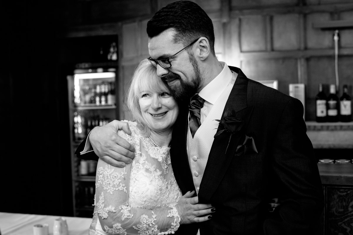 Sue is photographed with her son on her wedding day