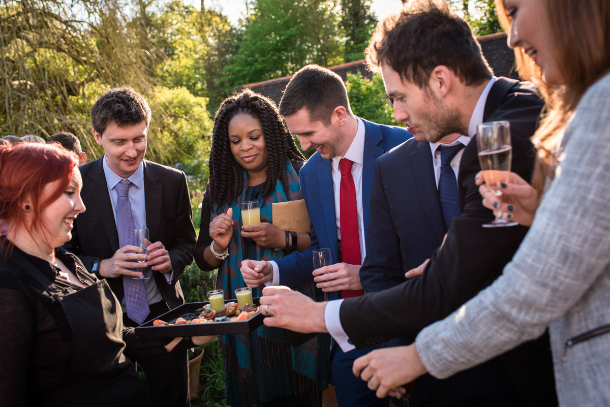 Brenchley Kent wedding photography of guests enjoying drinks reception