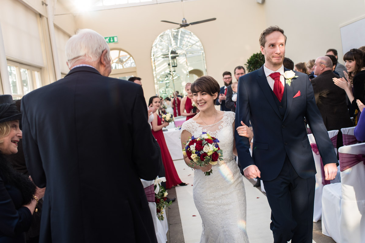 Joe and Bennet photographed leaving the ornery at Buxted Park Hotel after their wedding ceremony