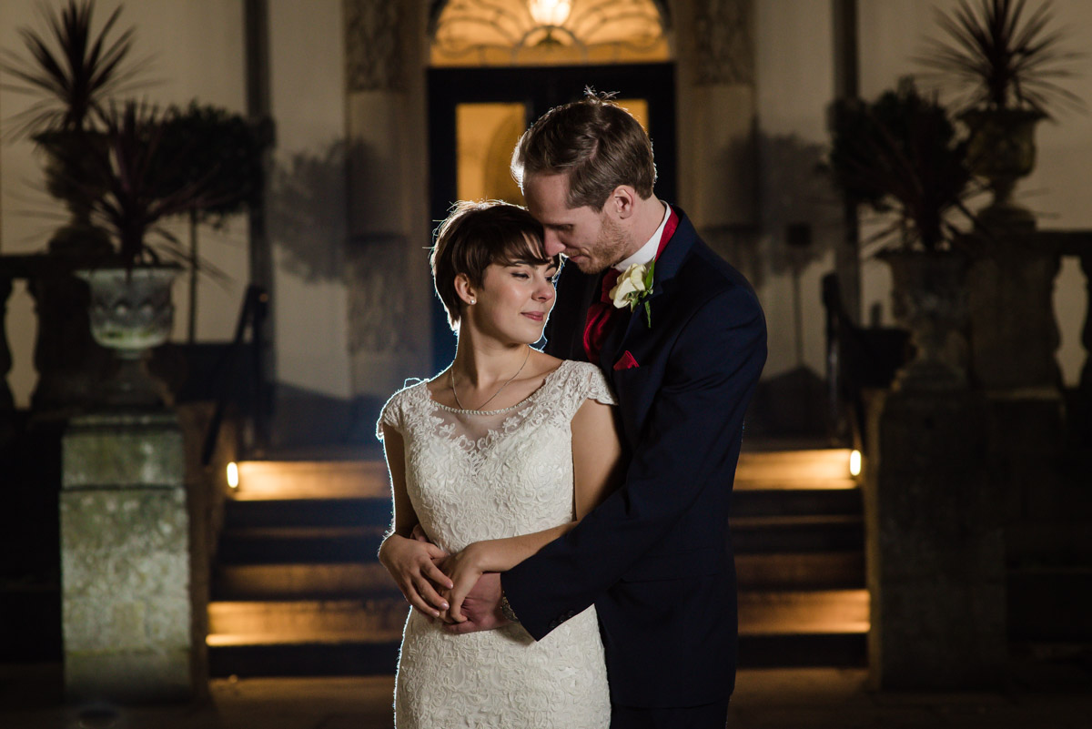 Buxted Park Hotel wedding photograph of Joe and Bennet outside