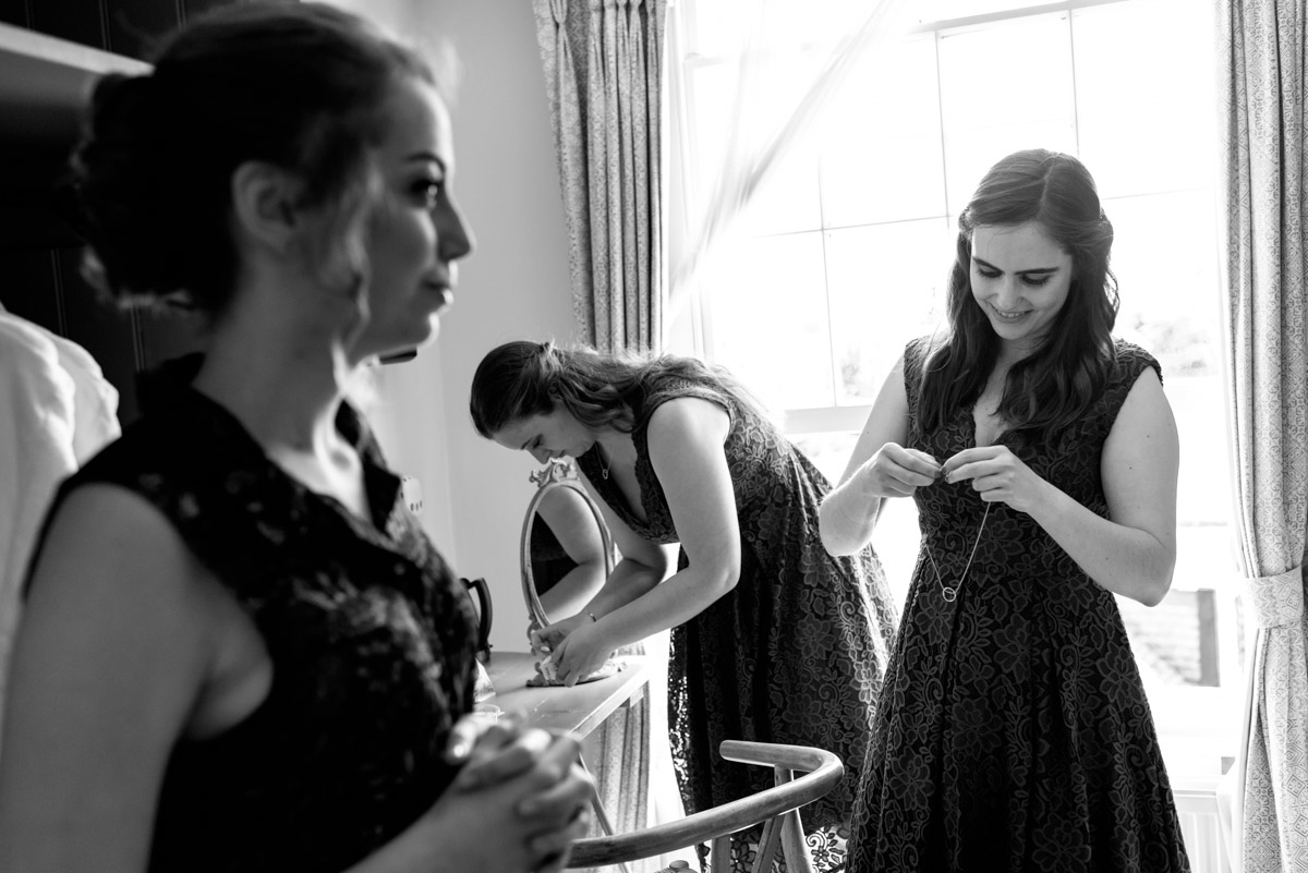 Bridesmaids getting ready for Beth & Toms Ratsbury Barn wedding in Kent