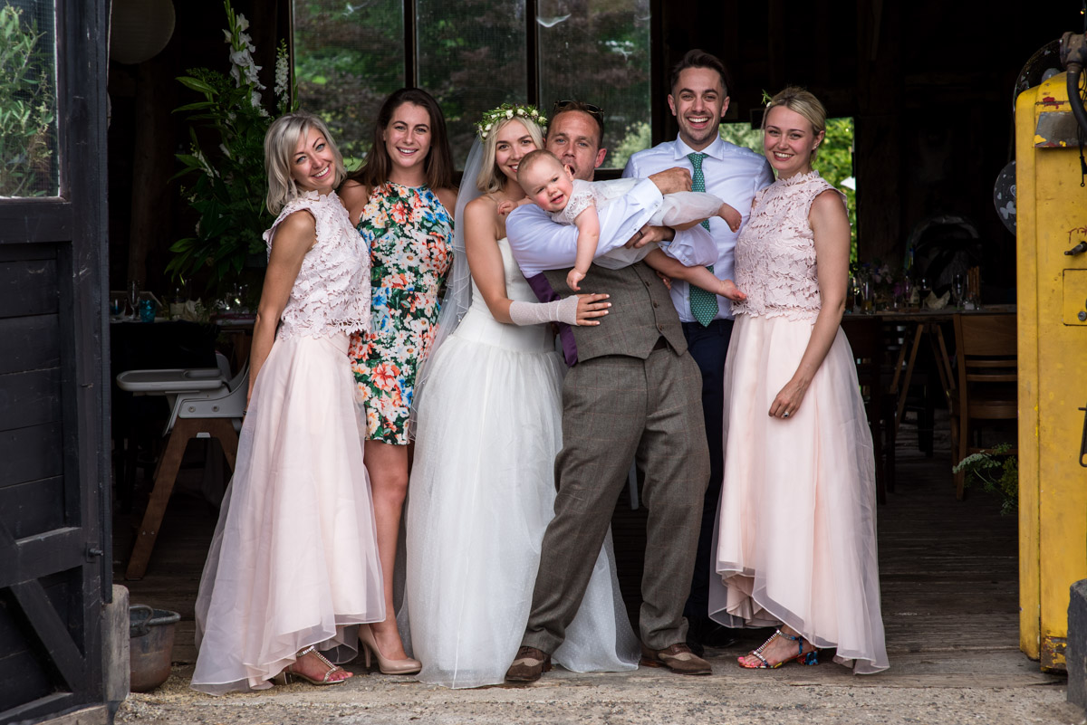 Group family wedding photograph at Kent reception