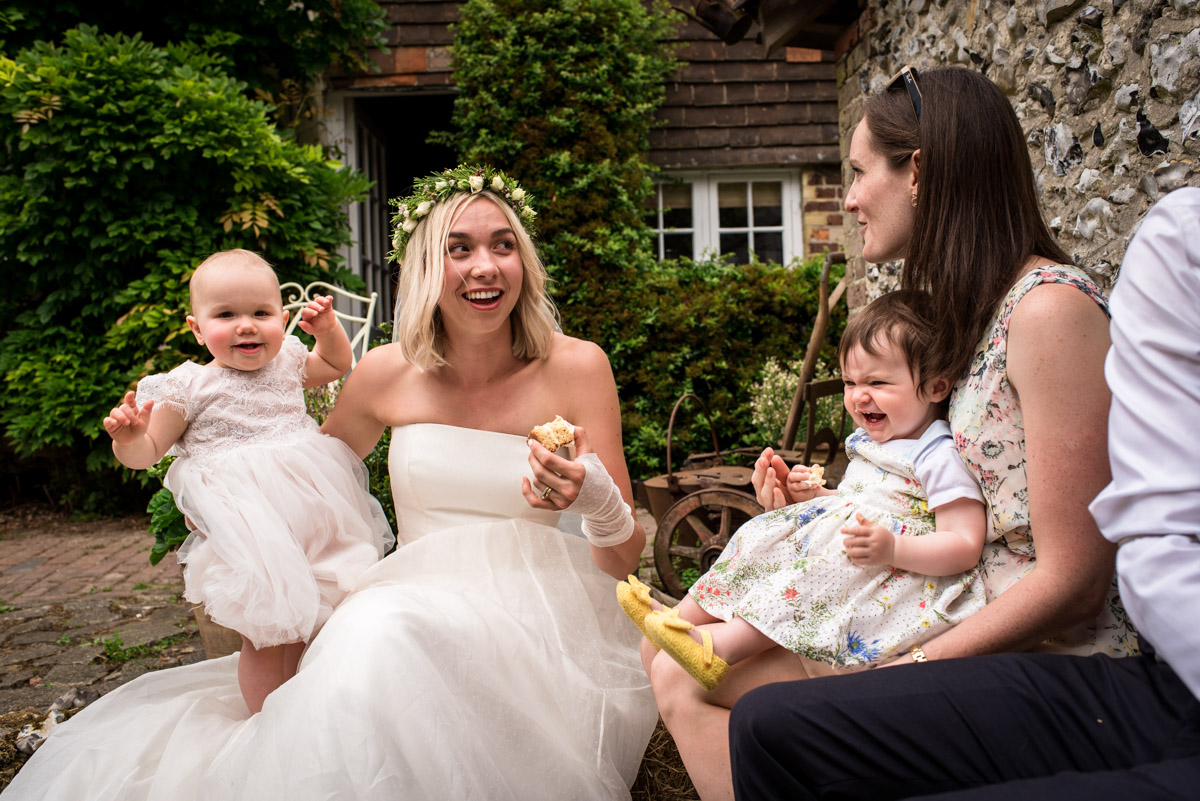 Photograph of Anne and friends at her Kent wedding garden reception