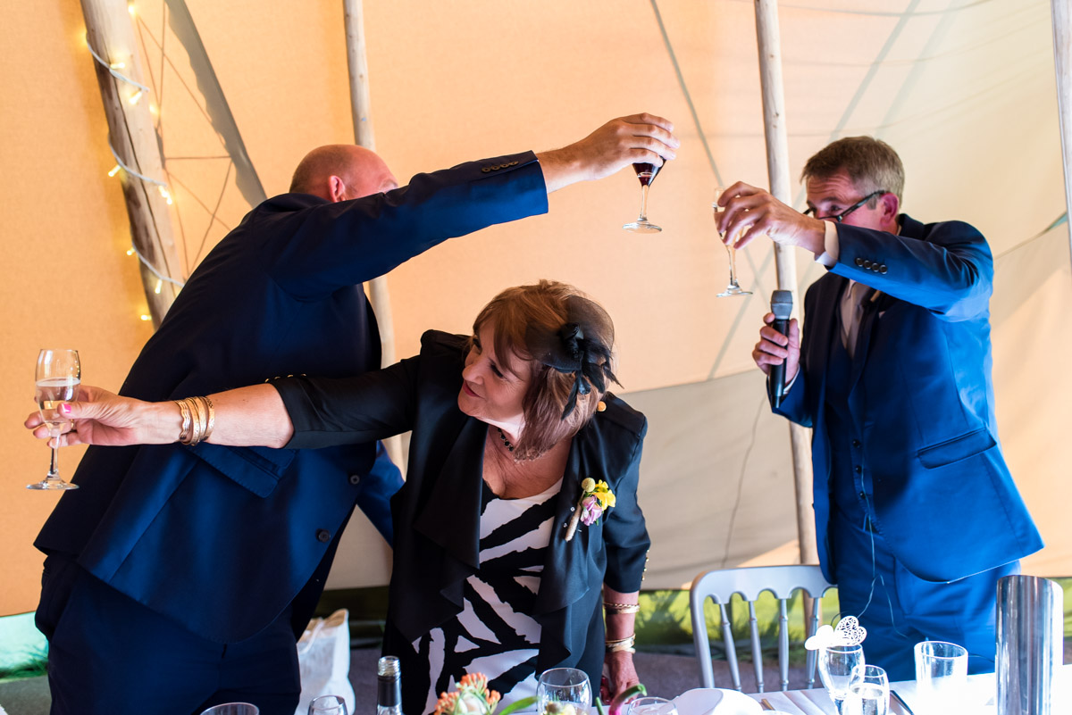 Toasting the speeches at Debbie and Martins wedding in Yalding