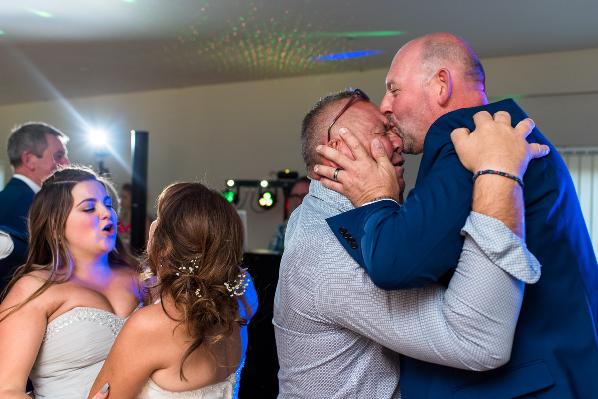 Photograph of Martin guessing the head of a wedding guest