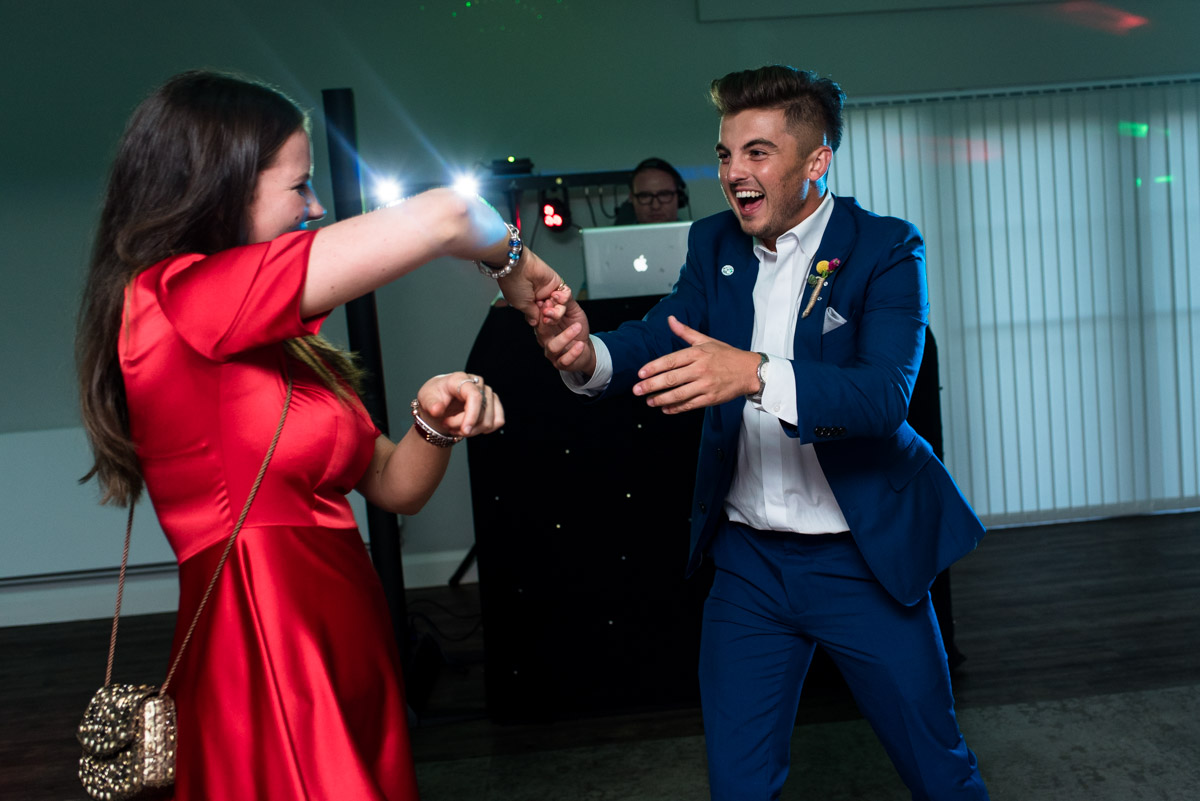 Photograph of guests dancing at The Gardens Yalding wedding venue in Kent