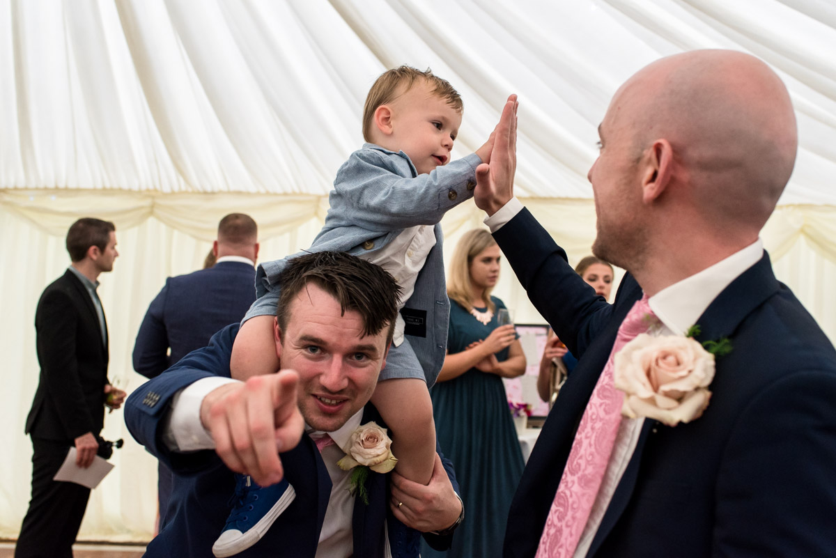 east sussex wedding photography, Tom and his guests at the reception