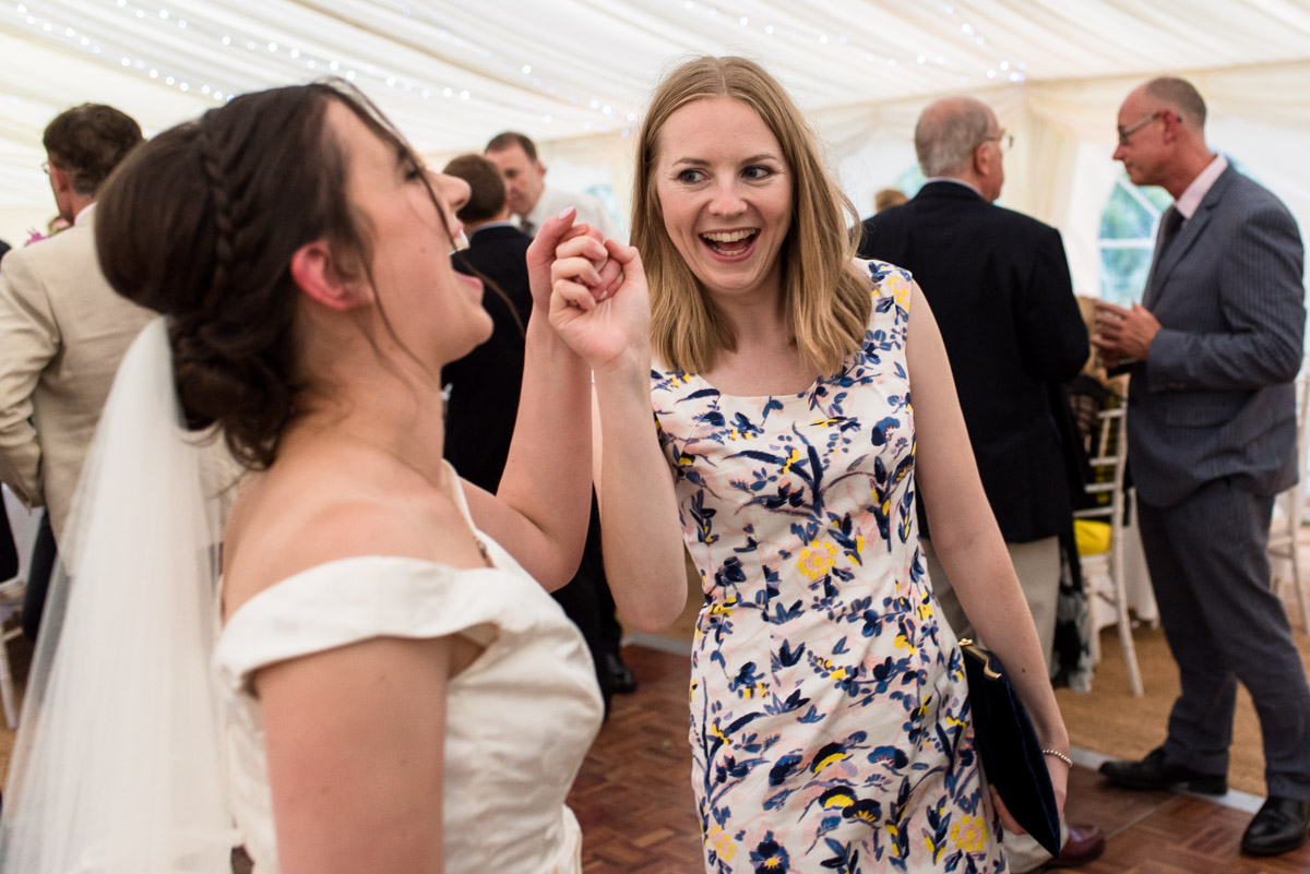 photograph of Emily and her wedding guest at the reception