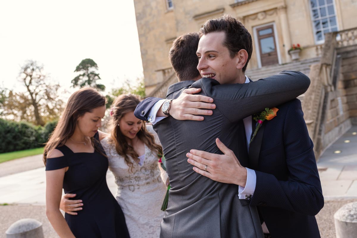 Photograph of Alex and James and wedding guests at Danson House in kent