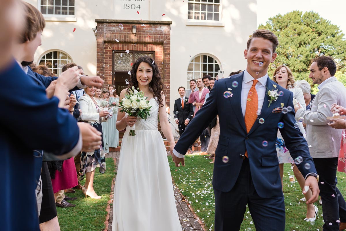 bubbles and confetti at Claire and Stefans wedding