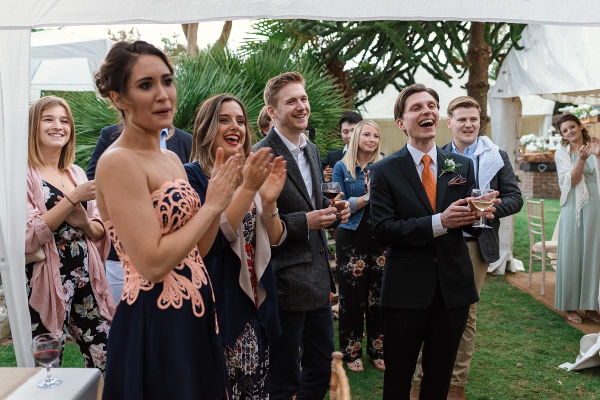 Guests welcome Claire and Stefan to their Braodstairs wedding reception