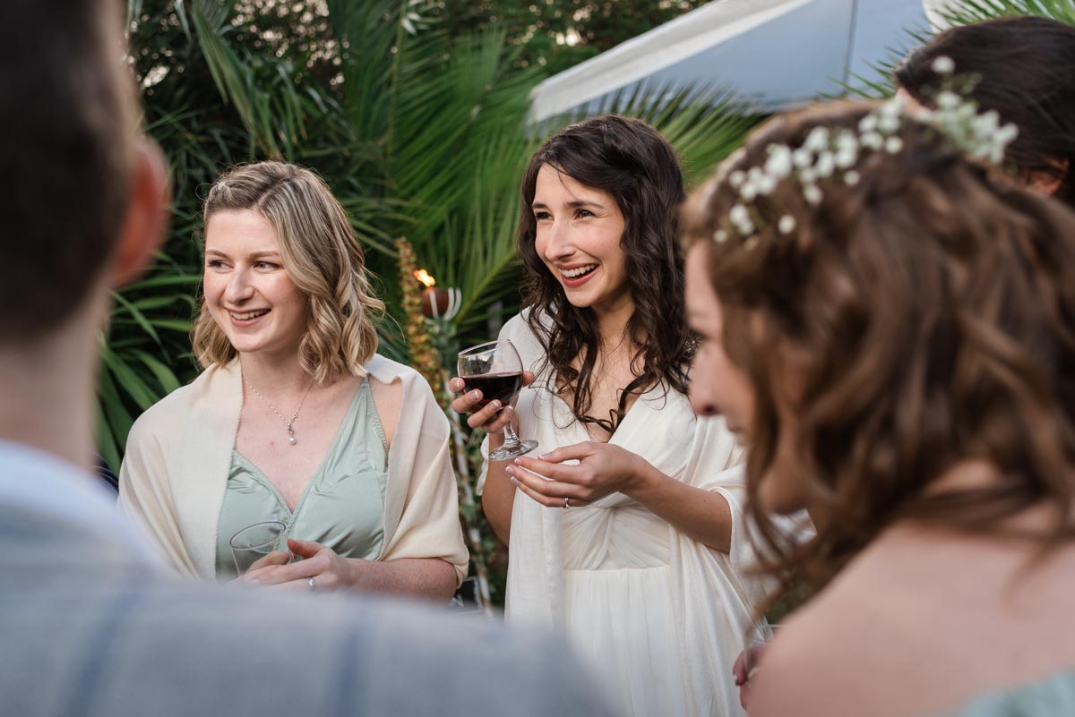 Claire photographed with friends on her wedding day