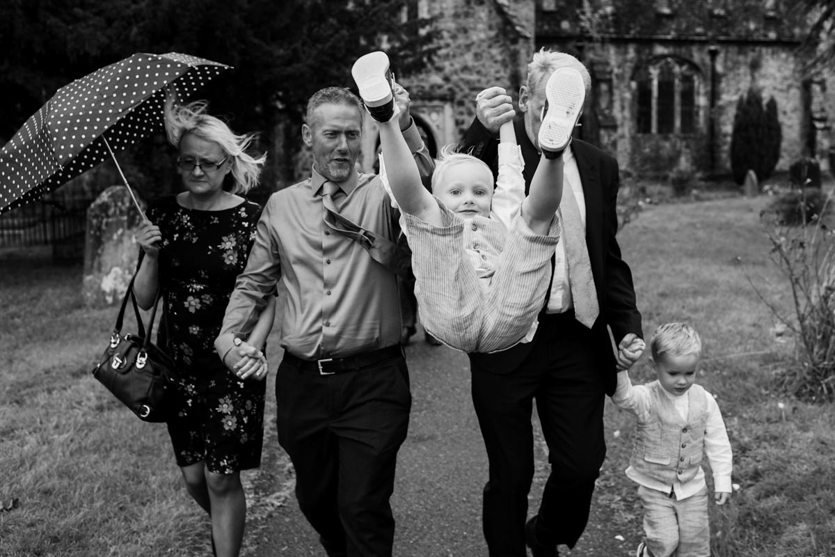 Harry gets a swing from wedding guests at his parents wedding