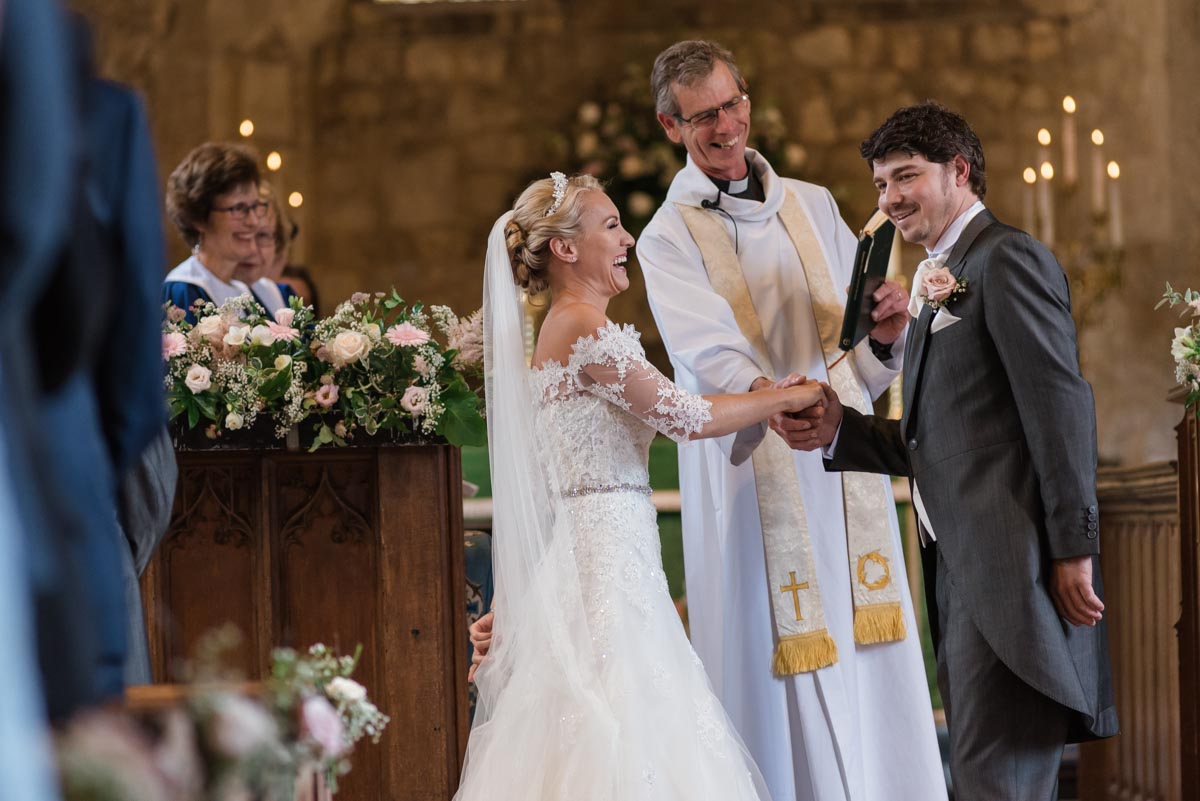 James and Rebecca photographed in Smarten Church on their wedding day