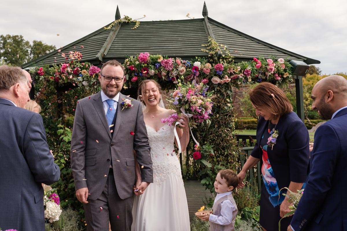 Confetti photograph at Sarah and Chris's secret garden wedding in kent