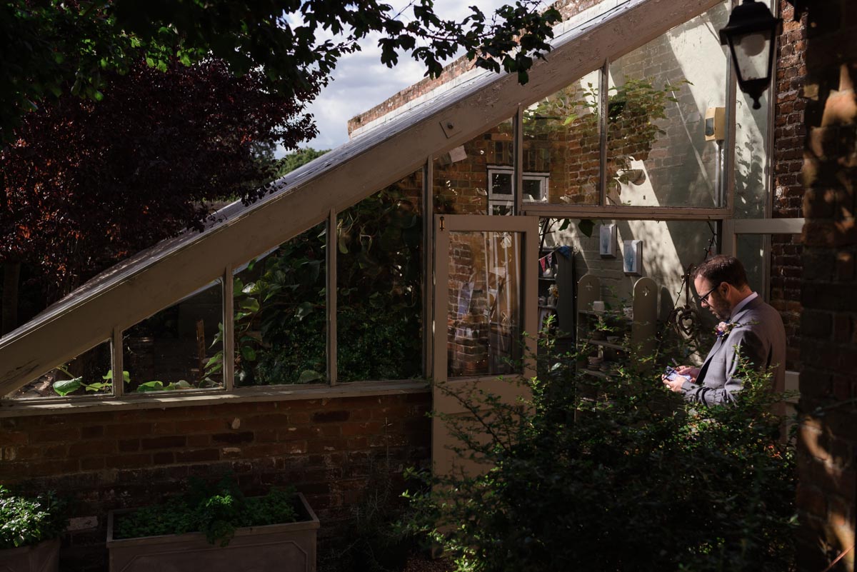 Chris goes over his speech outside the secret garden glass house
