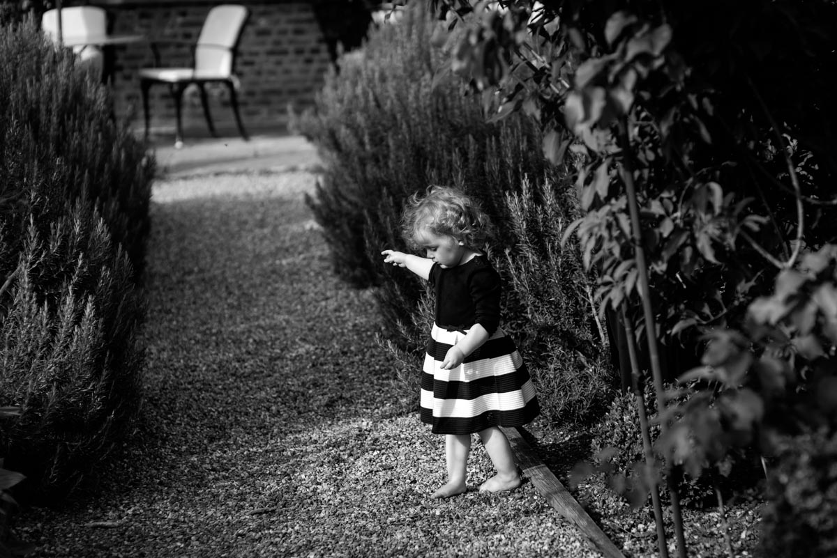 Photograph of little girl at Sarah and Chris's secret garden wedding