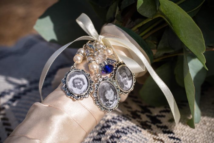 Miniature photographs on bridal bouquet