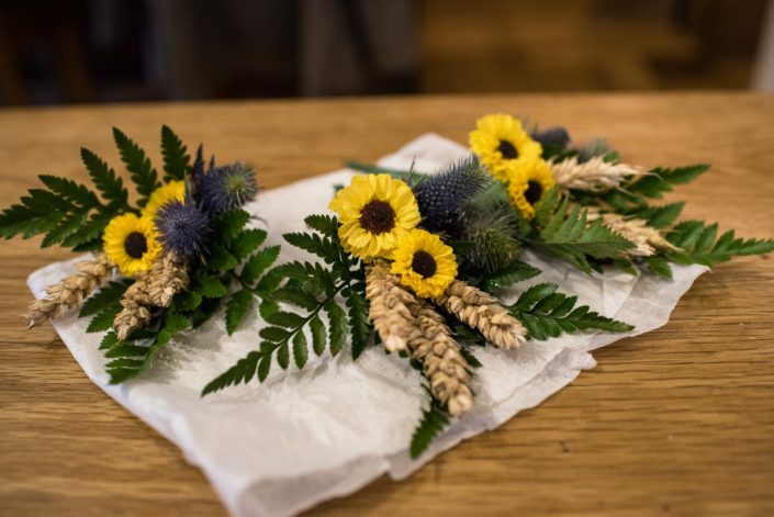 Miniature sunflower button holes