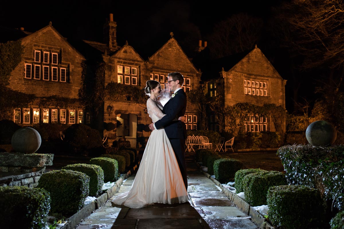 Photograph by Kent wedding photographer Helen Batt of Katehrine & Tom outside Holdsworth House