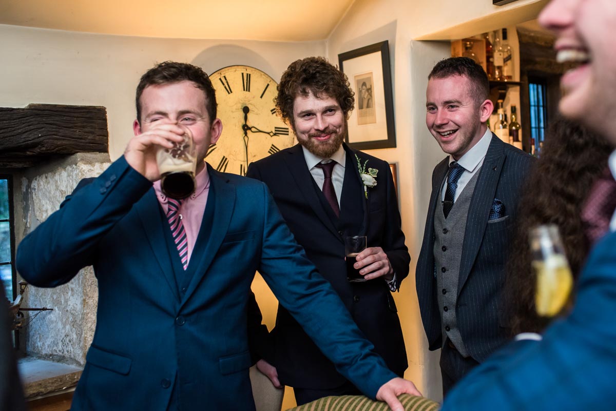Photograph of wedding guests inside Holdsworth House