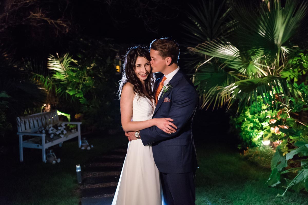 Photograph of couple lit by flash at their Kent wedding reception in Broadstairs
