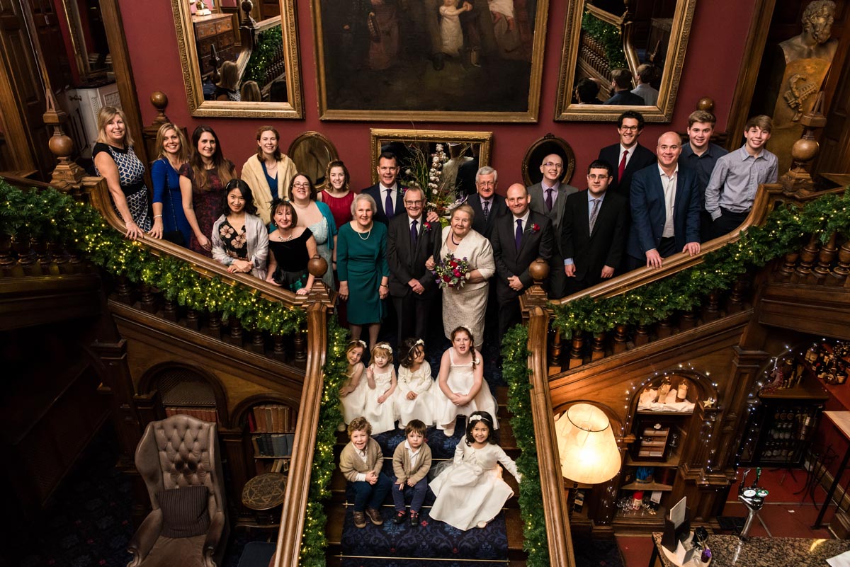 Chilkston park wedding photography, guests on the staircase